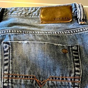 Never worn Diesel denim jeans for men. Size 36w and 32 L.
